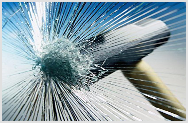 Antishatter-window-film-forced-breaking-in